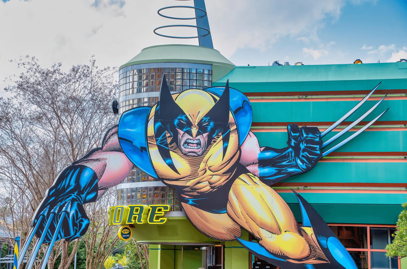 Building with a large superhero artwork on the side